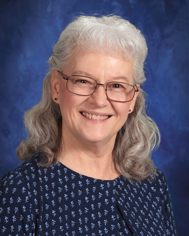 Portrait of Librarian Linda Reeves at Christian Fellowship School